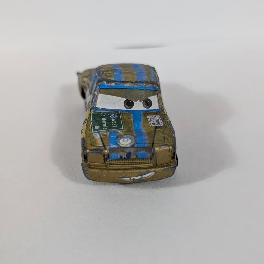 Disney Pixar Cars Mattel T-Bone Demolition Derby Diecast Vehicle 45 Gold Blue